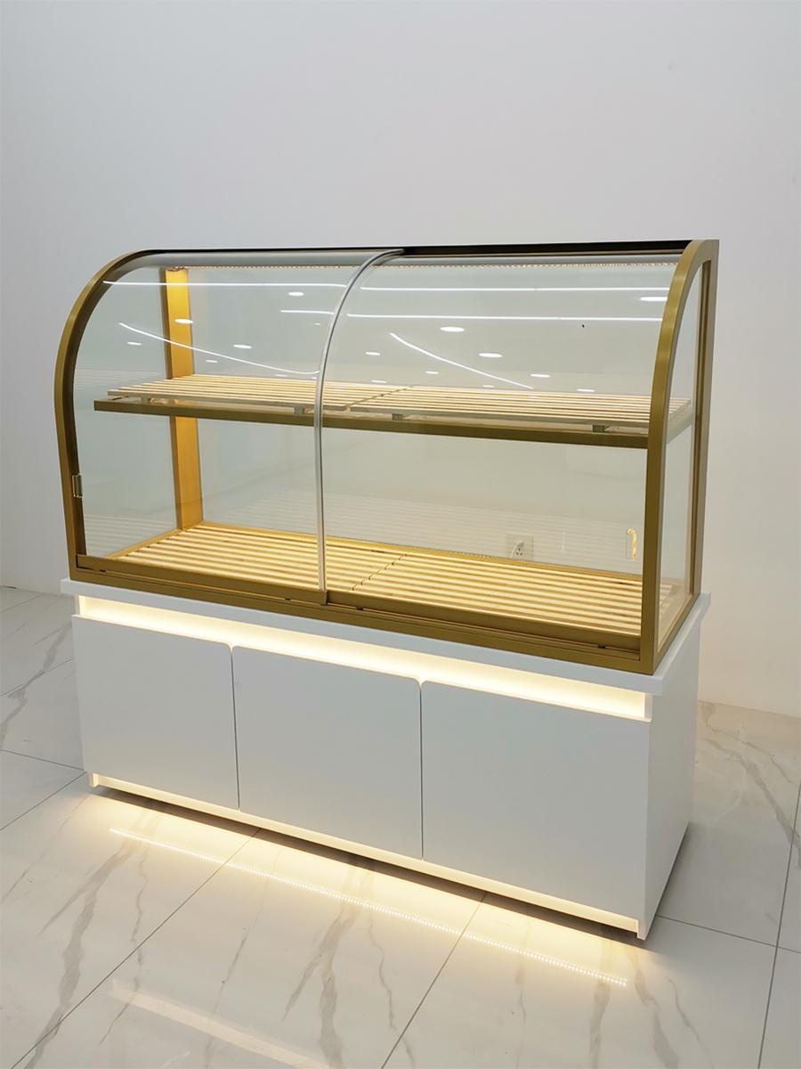 main_668482331380_0 스팟 사이드 캐비닛 빵 캐비닛 신규 고급 티타늄 도금 스테인리스 스틸 아크형 아일랜드 케이크 모델 캐비닛 유리 디스플레이 - 이미지 1