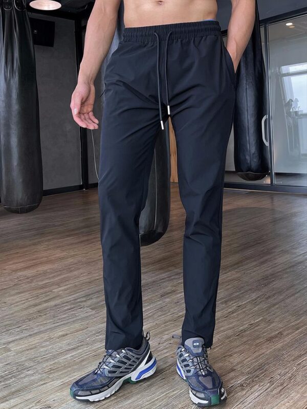 가을 겨울 피트니스 스포츠 캐주얼 팬츠 남성용 속건성 런닝 트레이닝 드로스트링 팬츠 슬림핏 포켓 지퍼 팬츠 트렌디