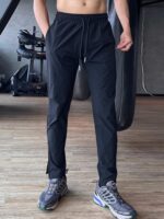 가을 겨울 피트니스 스포츠 캐주얼 팬츠 남성용 속건성 런닝 트레이닝 드로스트링 팬츠 슬림핏 포켓 지퍼 팬츠 트렌디 - 이미지 2