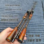 정품 아부 워썬더 강화 버전 MH+ 솔리드 우드 시더 대형 물고기 미끼 바다 낚시 미끼 스트레이트 핸들 건 핸들 블랙 피쉬 - 이미지 2